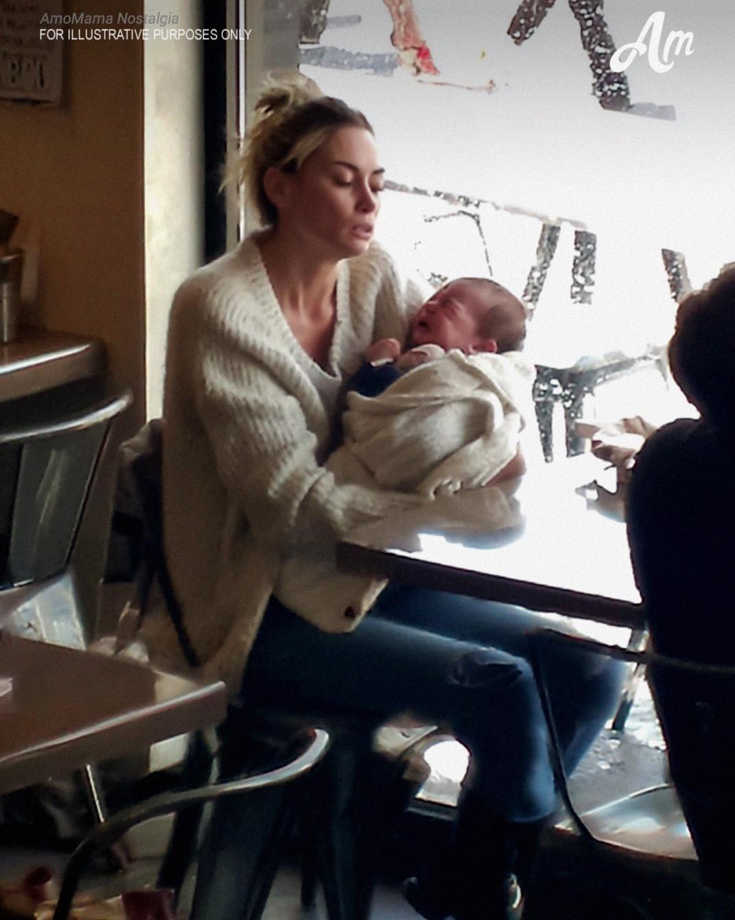 With Crying Baby Nearly Kicked Out of Café Until Strangers Stepped In